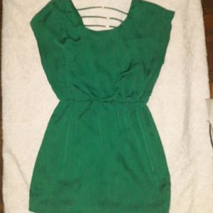 Green mini dress with back straps